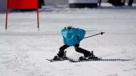 The robot is also racing to ski! But they probably haven't conquered the ice sport yet.