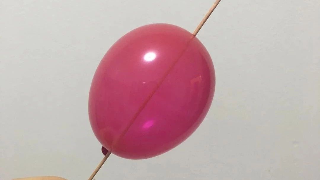Useless skills: bamboo sticks through balloons